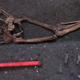 Context 958 was found buried face-down in the historic cemetery of St John’s. (Image credit: C. Cessford)
